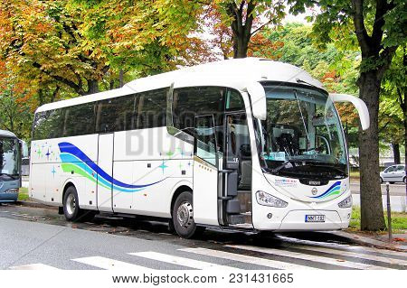 Paris, France - August 8, 2014: Touristic Coach Bus Irizar I6 In The City Street.