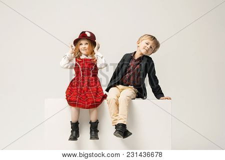 Cute Stylish Children On White Studio Background