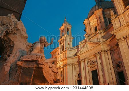 Danube River God Sculpture Representing Europe In Fountain Of The Four Rivers Pointing On Dusk Sant 