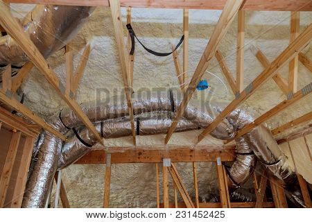 Insulation Of Attic With Fiberglass Cold Barrier And Insulation Material Insulation Attic Heating An