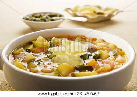 French Vegetable Soup, Soupe Au Pistou, Made From Summer Vegetables, With Pistou Sauce And Parmesan.