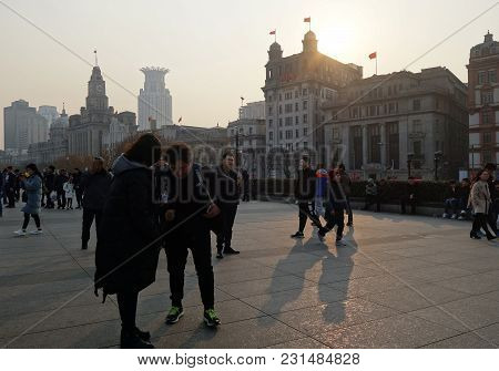 Shanghai, China- Jan 08, 2018: Unidentified People In A The Bund In Shanghai China. The Bund Or Wait