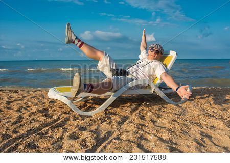 Old School Photographer Posing On A Beach