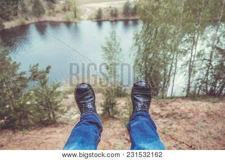 First Person Perspective Shot From A Hiker Sitting At The Edge Of A Cliff At Angel's Landing In Zion