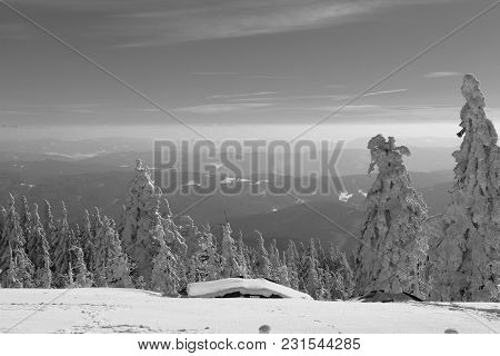 The Scenery From Lysa Hora In White And Black Colour With Hut Covered By Snow