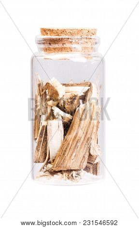 Dry Burdock In A Bottle With Cork Stopper For Medical Use. High Resolution Photo