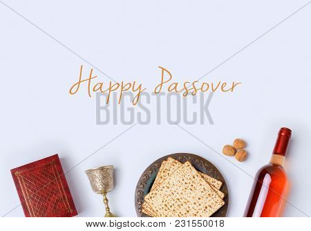 Jewish Holiday Passover Frame Composition With Wine, Matzo And Seder Plate On White Background. View