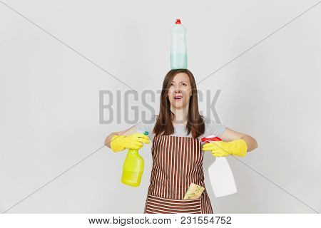 Fun Housewife In Yellow Gloves, Striped Apron, Cleaning Rag In Pocket On White Background. Woman Hol