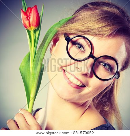Delicacy And Subtlety Of Women. Young Adorable Woman With Spring Flower. Portrait Of Beauty Delicate