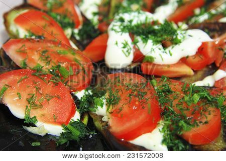 Fried Eggplants And Fresh Tomato With Souce And Herbs
