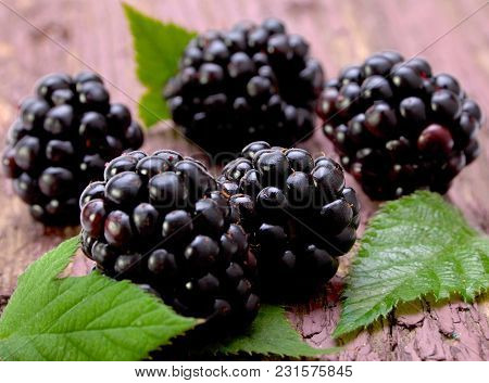 Balckberry Fruit Closeup On Old Wood Background