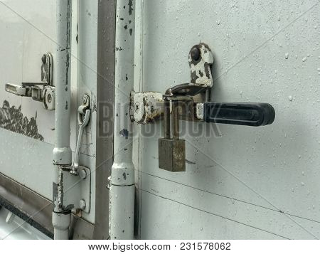 Close Up Door Lock Of The Container Truck