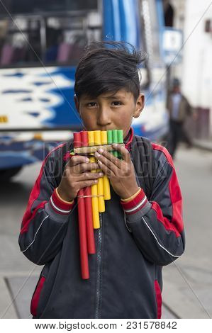 La Paz, Bolivia - January 12, 2018: Unidentified Boy With Pan Flute At Street Of La Paz, Bolivia. At