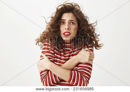 Where Is Summer. Portrait Of Cute Gloomy Caucasian Girl With Hair Flying In Air Trembling And Feelin