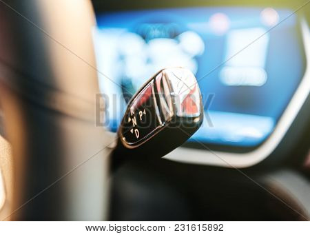 Automatic Gearbox Near The Steeringwheel Of A New Electric Car In Modern Showroom