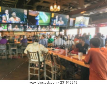 Blurred People At Sports Bars And Restaurants In America