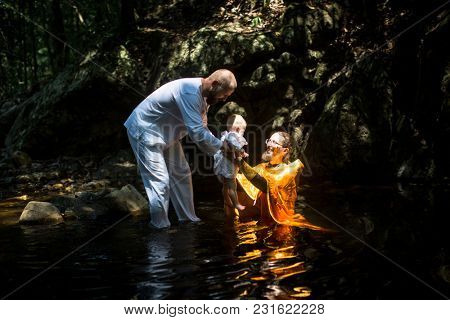 KOH CHANG, THAILAND - MAR 10, 2018: During Christian sacrament of spiritual birth - Baptism. There are currently 10 Orthodox parishes in Thailand, Orthodoxy is practiced by 0.002% of population.