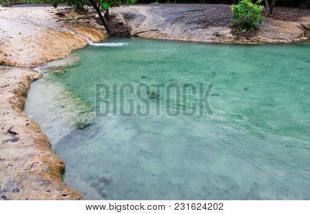 Green Emerald Pool And Water Fall Thailand Rainy Day