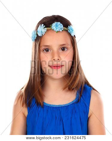 Beautiful small girl with blue dress and a flowersÃÂ´ wreath on her head isolated on a white background