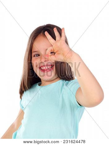 Friendly child saying Ok with her hand isolated on a white background