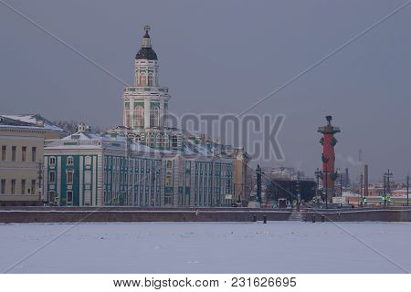 Saint Petersburg, Russia - February 08, 2018: Kunstkammer And South Rostral Column In The February T