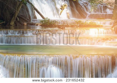 Natural Stream Water Fall In Tropical Forest, Landscape Background