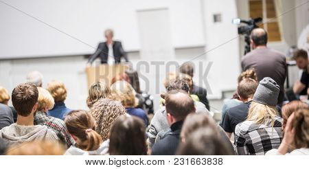 Speaker Giving A Talk In Conference Hall At Business Event. Audience At The Conference Hall. Busines