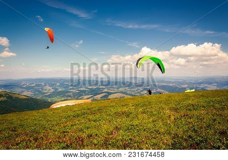 Skydiving  Flying Over The Mountains. Parachute Extreme Sport