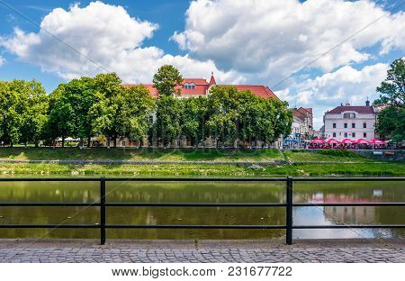 Uzhgorod, Ukraine - Jun 15, 2017: Embankment Of Uzh River In Summer. Beautiful Architecture And Blos