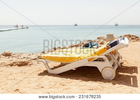 Half Turn View Chaise Longues On The Beach Beach Chaise Longues