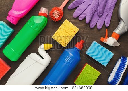 Spring Cleaning Background. Assortment Of Colorful Spray Detergents, Sponges, Rags And Other Supplie