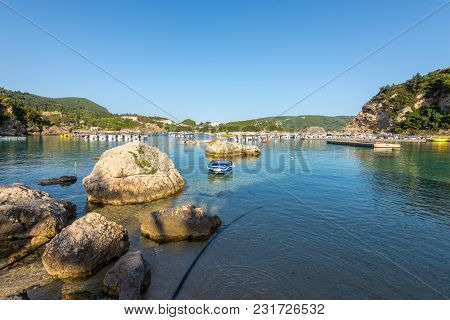 Alipa Beach In Paleokastritsa Bay With Sand And Crystal Sea Water. Corfu Island, Greece.