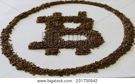 Bitcoin Is Made By Hand From Black Plastic, Isolated On White Background. Unique Image, Concept.