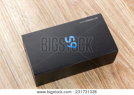 March 2018. Samsung Galaxy S9 In The Box Close-up. A New Smartphone Sealed In A Box On A Wooden Tabl