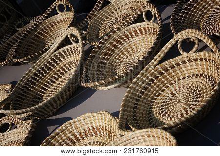 Typical Sweetgrass Woven Baskets On Display For Sale In Historic Charleston, South Carolina In The L