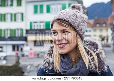 Portrait Of Attractive Young Female Toursit In Interlaken, Switzerland - Exploring The City