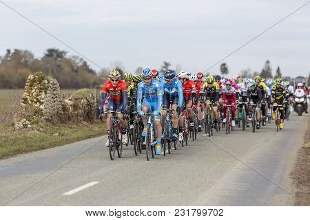 Fains-la-folie, France - March 5, 2018: The Peoton Riding On A Country Road During The Stage 2 Of Pa