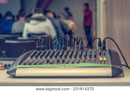 Closeup Of Mixing Console At Live Presentation. Audio Adjustment.
