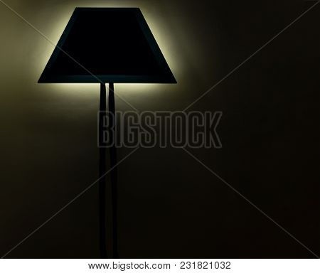 The Modern Sconce  Shines With Light On The Wall. The Scattered Light Creates Abstract View On Sligh