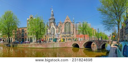 Panorama Of Medieval Church Oude Kerk Built In The 14th Century With Oudezijds Voorburgwal Channel A