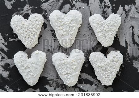 Sweet Crunchy Coconat Heart-shaped Biscuits Arranged In Pattern On Light Textured Background, Top Vi