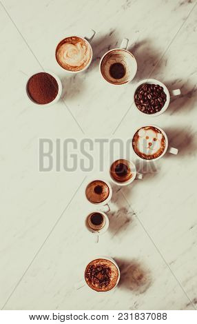 Set Of Different Coffee Cups As A Question Mark, Top View , Top View. Phylosophy Of Life Concept
