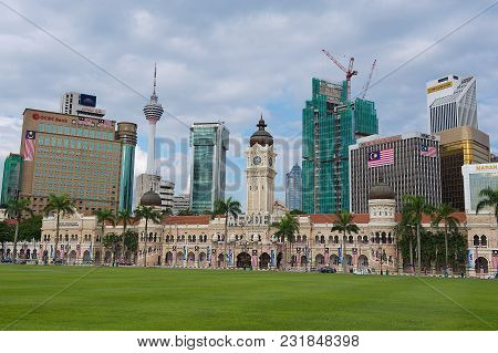 Kuala Lumpur, Malaysia - August 29, 2009: View To The Sultan Abdul Samad Building With Modern Buildi