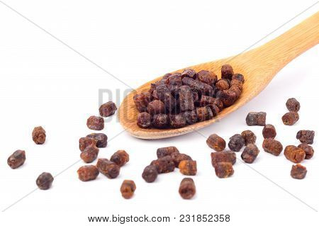 Granules Of Bee Bread In A Wooden Spoon Are Isolated On A White Background. Apitherapy. Beekeeping P