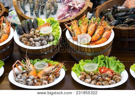 Grilled Shrimps,shellfish, Crab, Fish, Thai Street Foods Thai Sea Food On The Table In Market Of Ban
