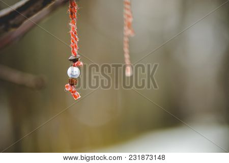 Martenitsa With Smile And Water Drop Under The Rain .