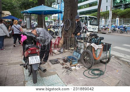 Ho Chi Minh-vietnamm-november 4,2016 ;repair Motorbike Garage On Street In Ho Chi Minh City , The Ci