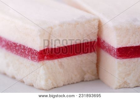 Two Pieces Of Pastila With Red Marmalade Inside