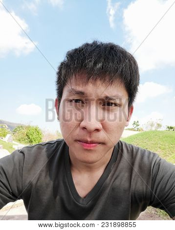 Asian Man Has Selfie With Hot Feeling And Boring At Qingming Festival Or Tomb Sweeping Day In Sarabu