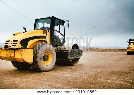 Tandem Road Roller Vibroroller Finishing The Earth Layer At Road Construction
